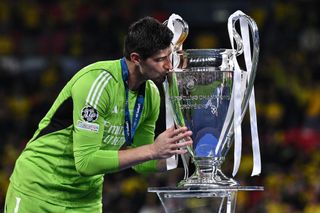 Thibaut Courtois of Real Madrid celebrates UEFA Champions League victory at the end of the UEFA Champions League 2023/24 final match between Borussia Dortmund v Real Madrid CF at Wembley Stadium on June 01, 2024 in London, England.