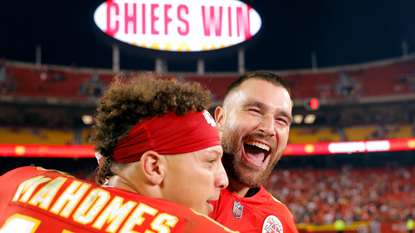 Patrick Mahomes #15 and Travis Kelce #87 of the Kansas City Chiefs celebrate after the Chiefs defeated the Las Vegas Raiders 30-29 to win the game at Arrowhead Stadium on October 10, 2022 in Kansas City, Missouri.