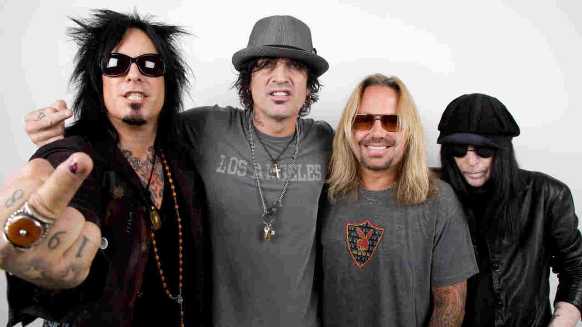 Motley Crue posing for a photograph in the mid-2010s