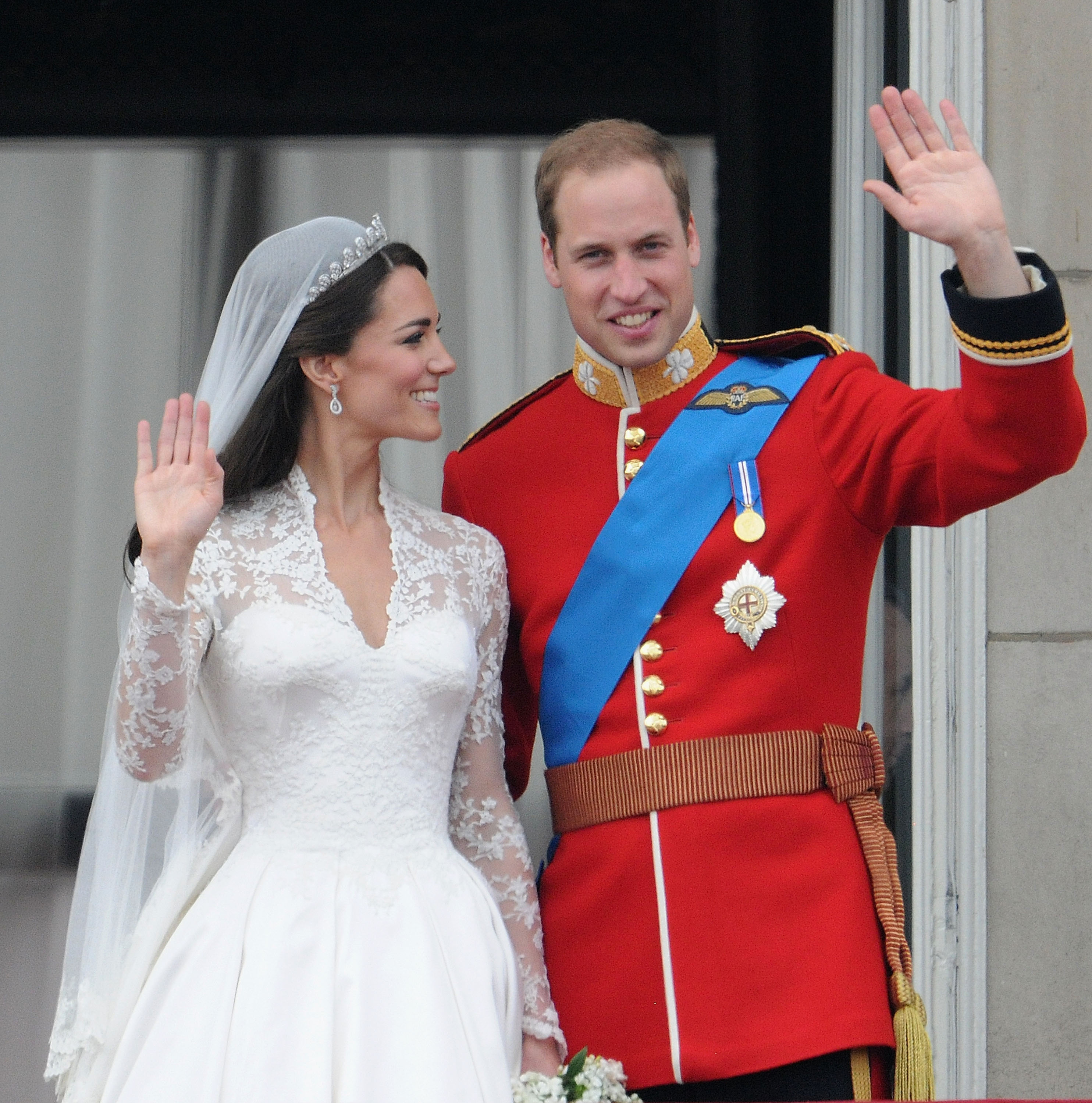 Princess Kate and Prince William waving on their wedding day