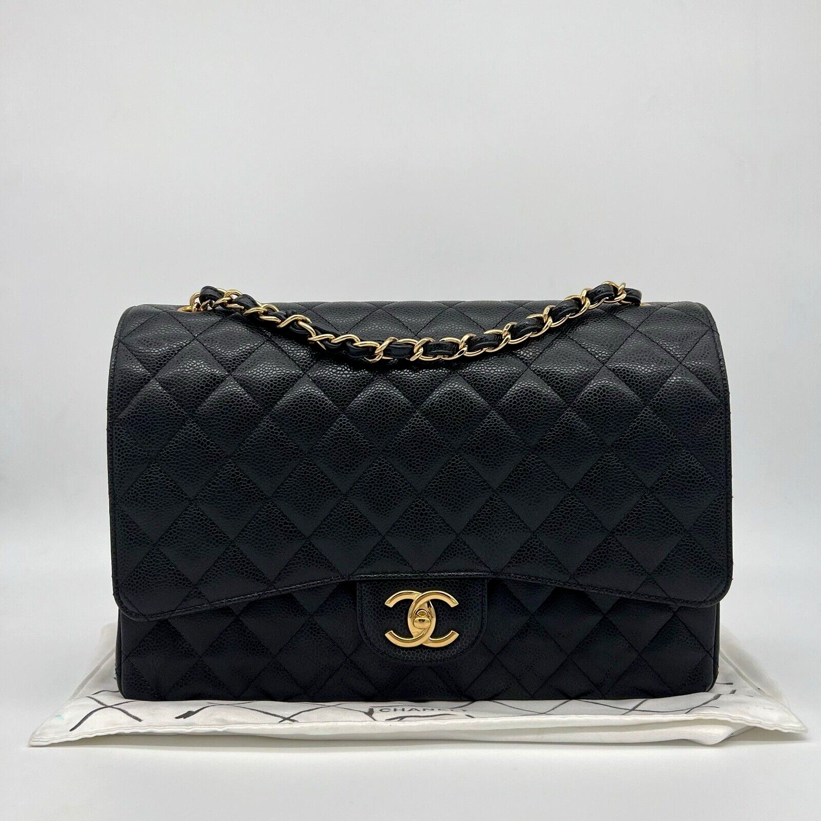 Chanel Classic Timeless Maxi Double Flap Bag Black Caviar Leather Gold Hardware