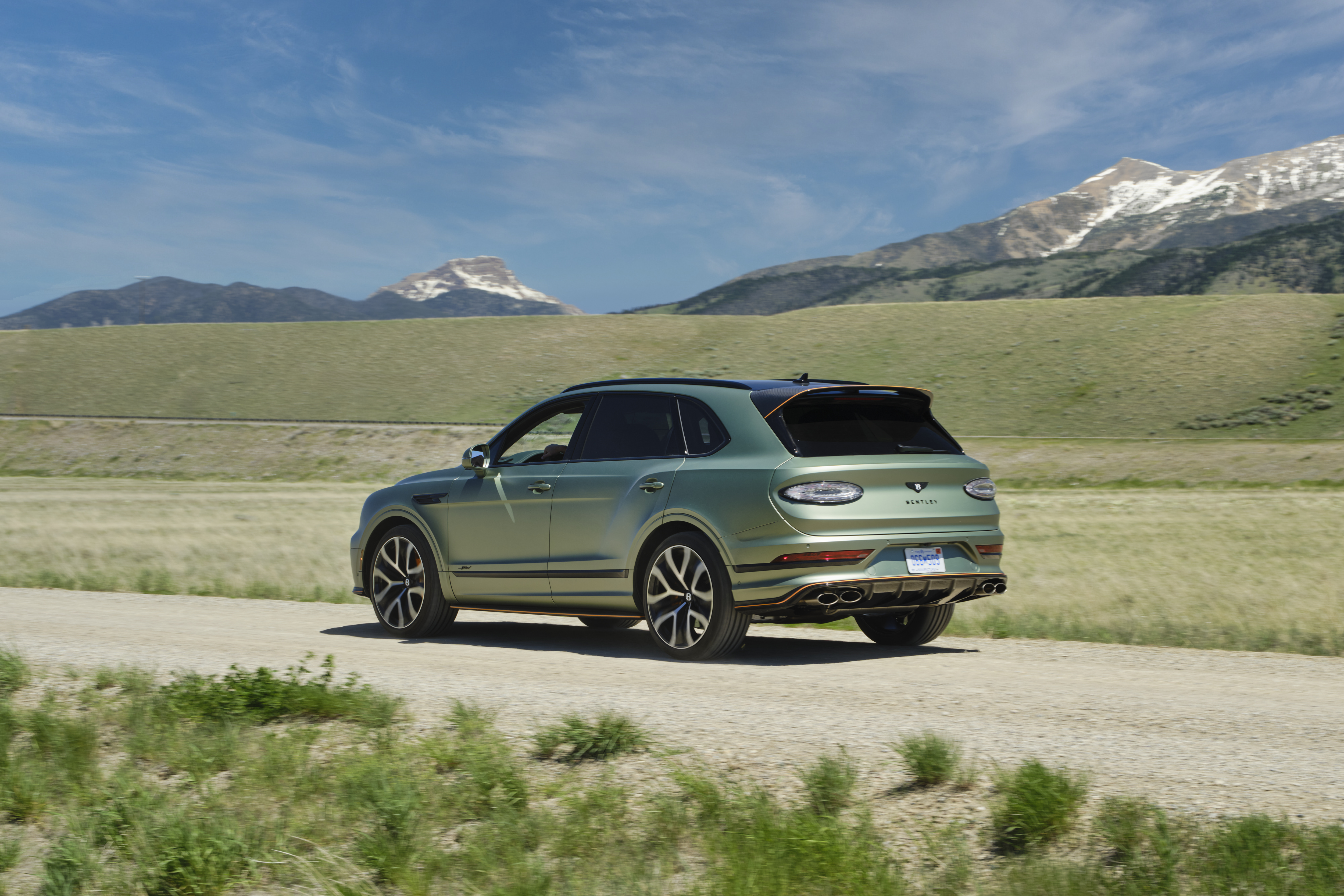 Detail of the Bentley Bentayga, in Alpine satin green, in Yellowstone National Park