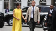 Meghan (L), Duchess of Sussex, and Britain's Prince Harry (R), Duke of Sussex arrive at the State Governor House in Lagos on May 12, 2024 as they visit Nigeria as part of celebrations of Invictus Games anniversary.