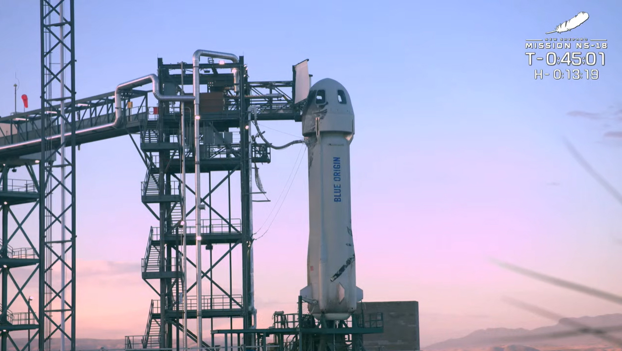 The Blue Origin New Shepard rocket that will launch William Shatner and three others to space is seen atop Launch Site One in West Texas during launch preparations on Oct. 13, 2021.