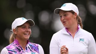 Sara Bryne and Lottie Woad talk at the Curtis Cup