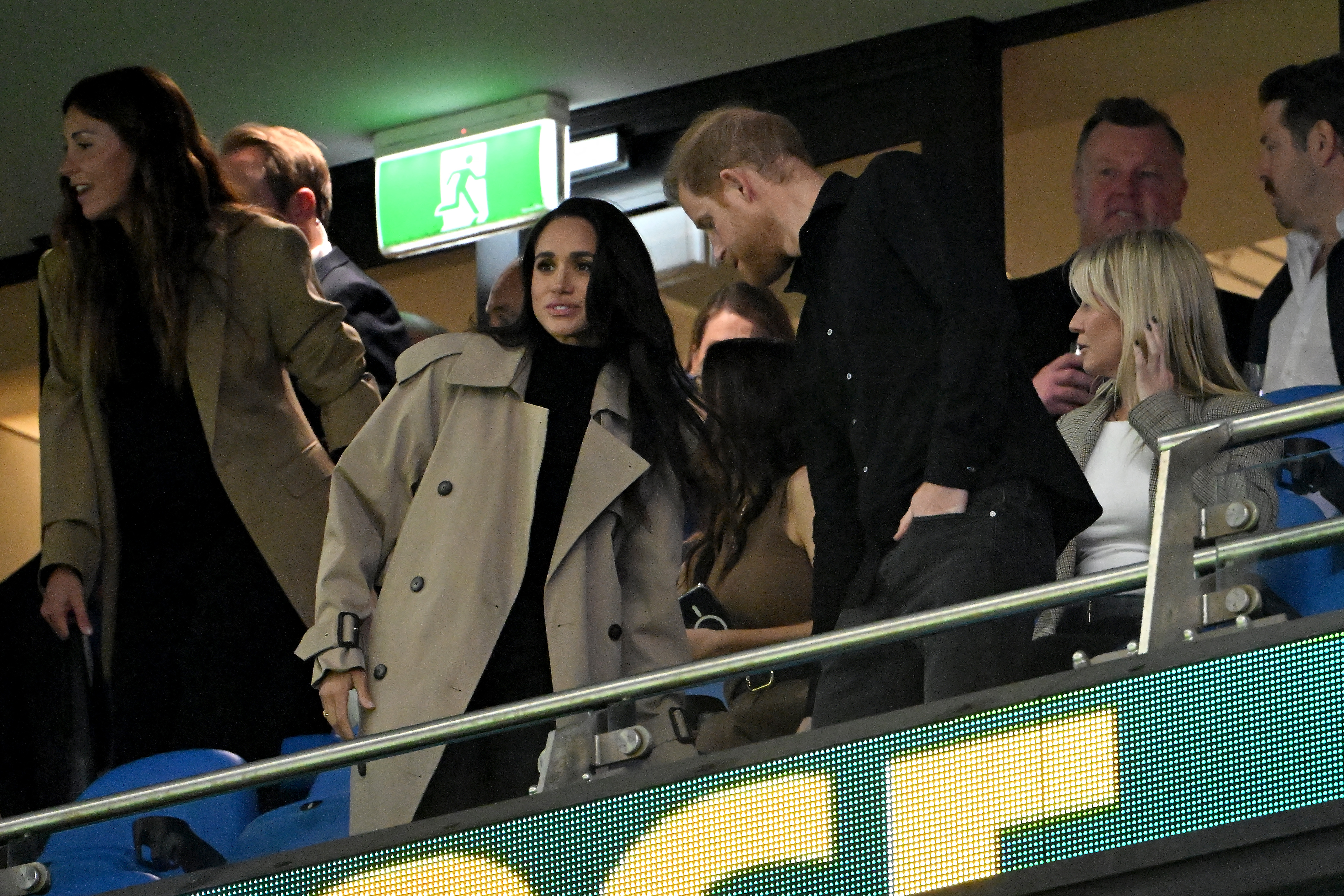 Britain's Prince Harry, Duke of Sussex, and his wife Meghan, Duchess of Sussex, arrive to watch super rugby match between NSW Waratahs and Moana Pasifika at Allianz Stadium in Sydney on April 17, 2026