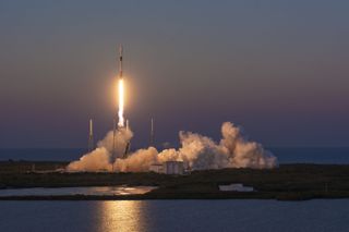black-and-white spacex falcon 9 rocket launches from florida 