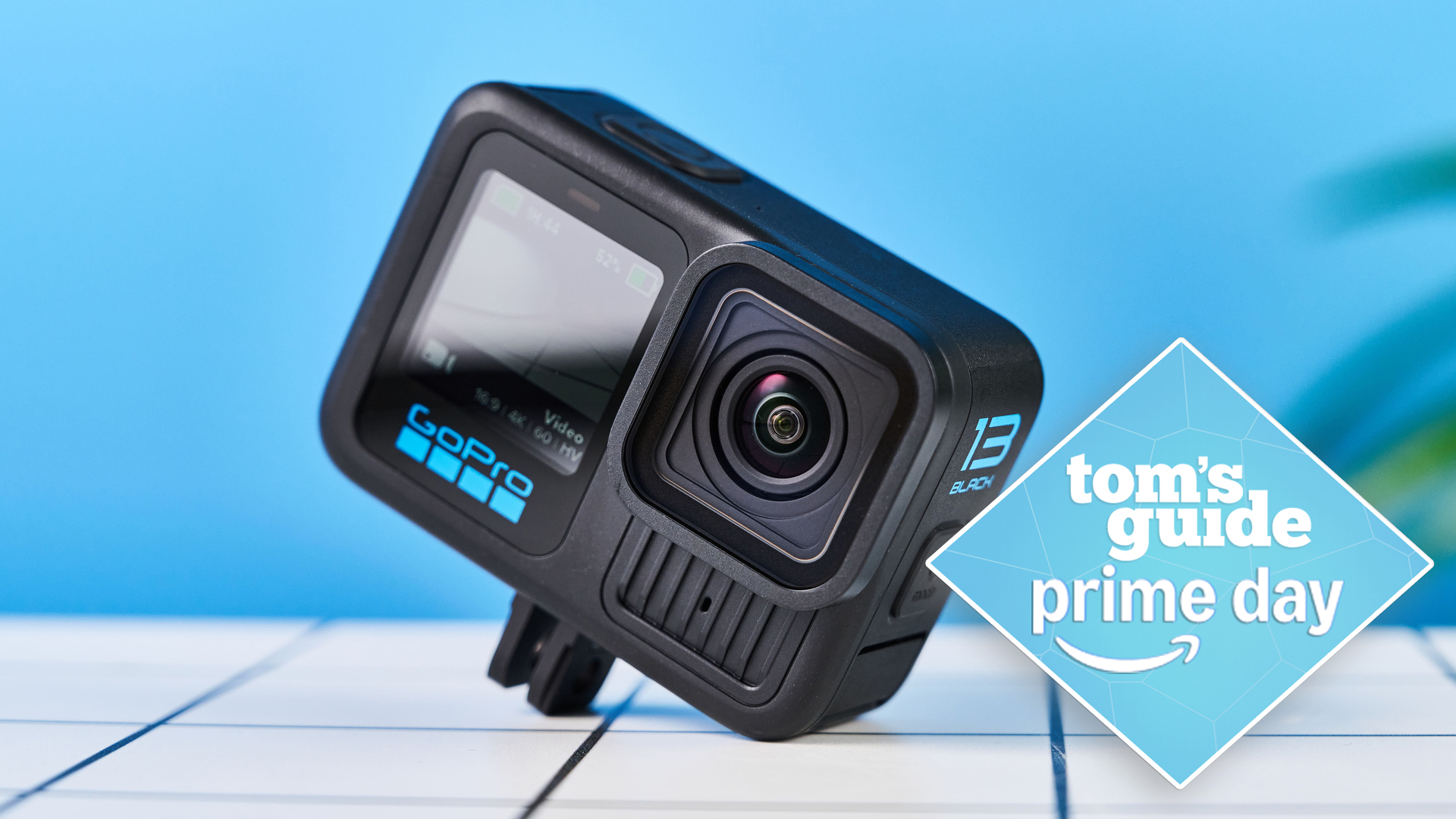 The GoPro Hero13 Black against a blue background with a Tom&#039;s Guide Prime Day deal badge in the lower right of the image
