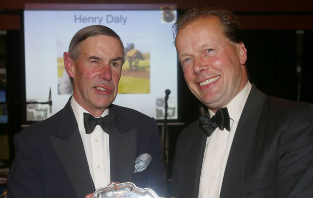 Richard Russell presents Henry Daly with The Greenall Russell Trophy leading hunter chase trainer Point to Point Awards - Cheltenham 15.11.14 Pic Dan Abraham-racingfotos.com