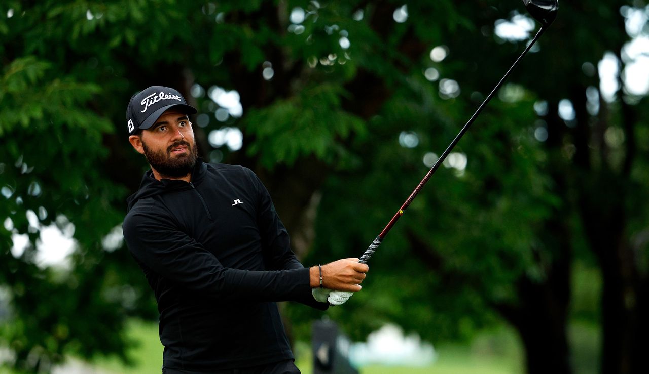 Curtis Luck strikes his tee shot