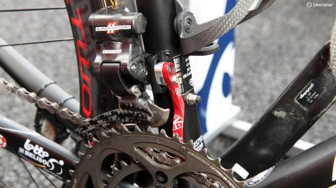The Campagnolo Super Record EPS front derailleur is backed up with a K-Edge chain catcher. The charge port for the internally housed battery is situated on the seat tube just below the bottle cage