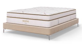 Saatva mattress sales, deals and discount codes: The Saatva Classic Mattress on a beige bed frame