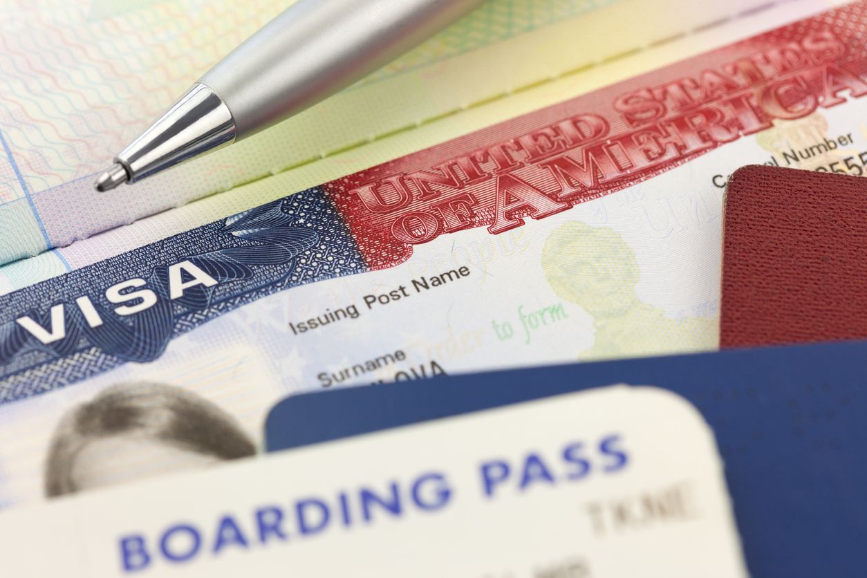 Visa and boarding pass.