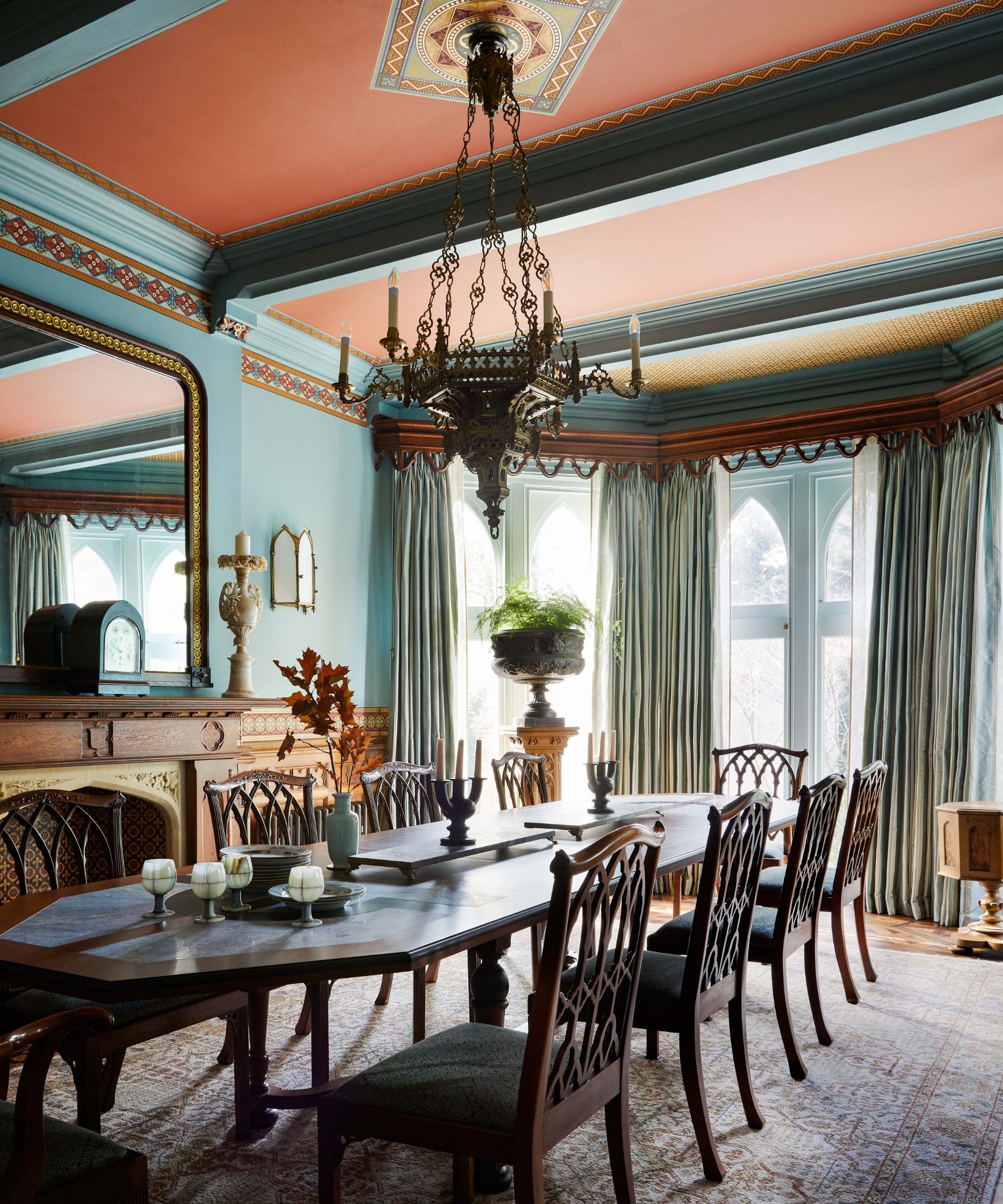 Gothic dining room with a chandelier of the era