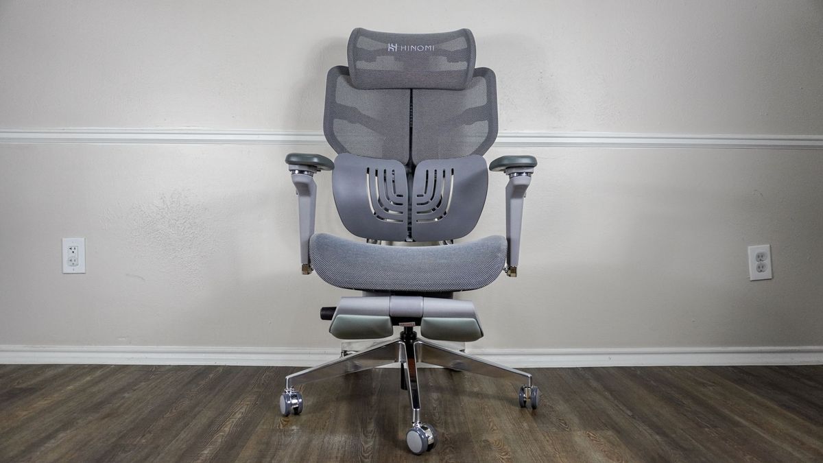 The Hinomi X1 ergonomic office chair up against a wall