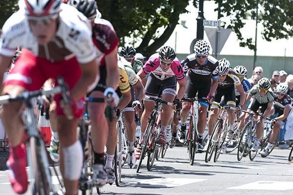 The peloton corner on the roundabout at the top of the home straight in Williamstown.