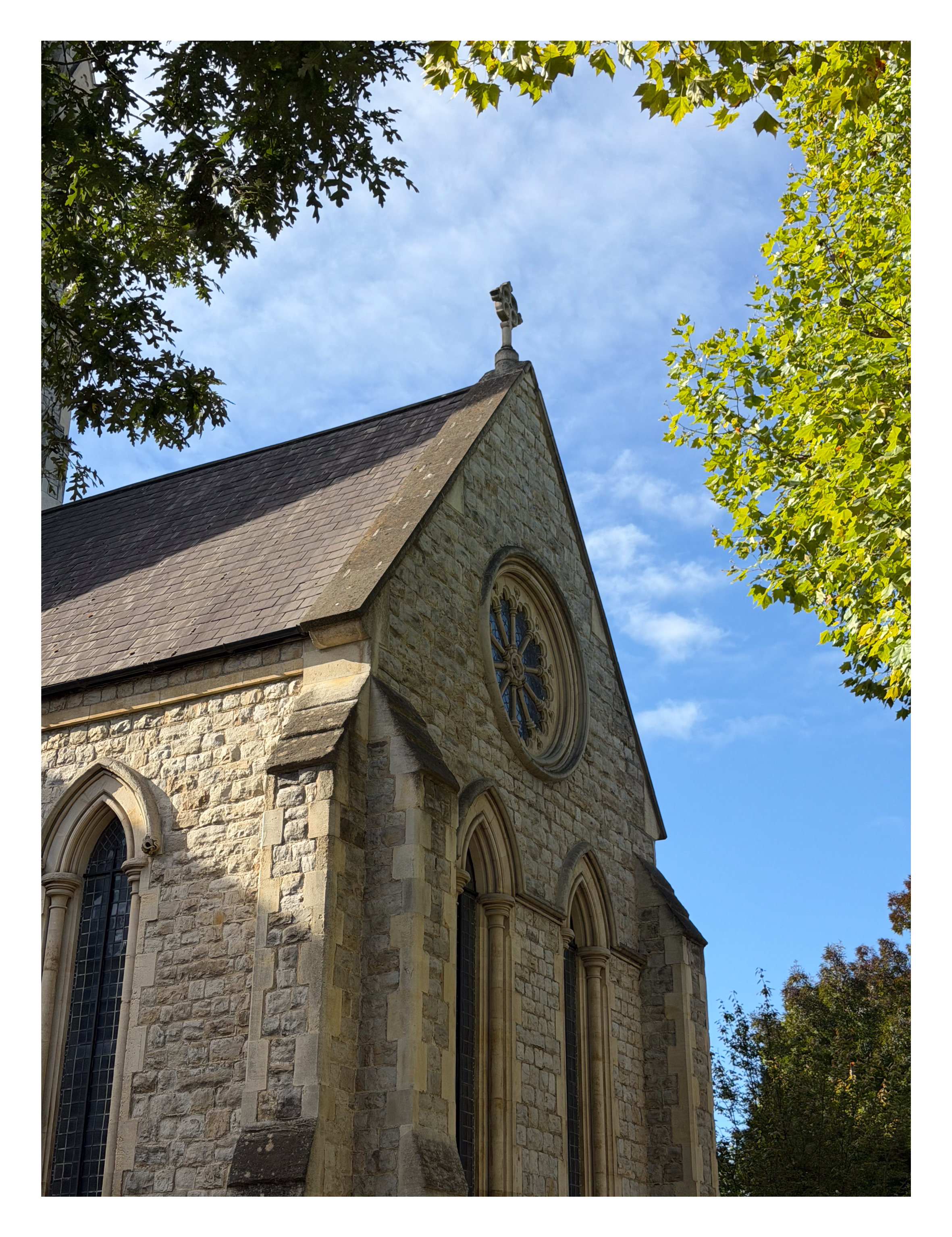 A church seen between trees