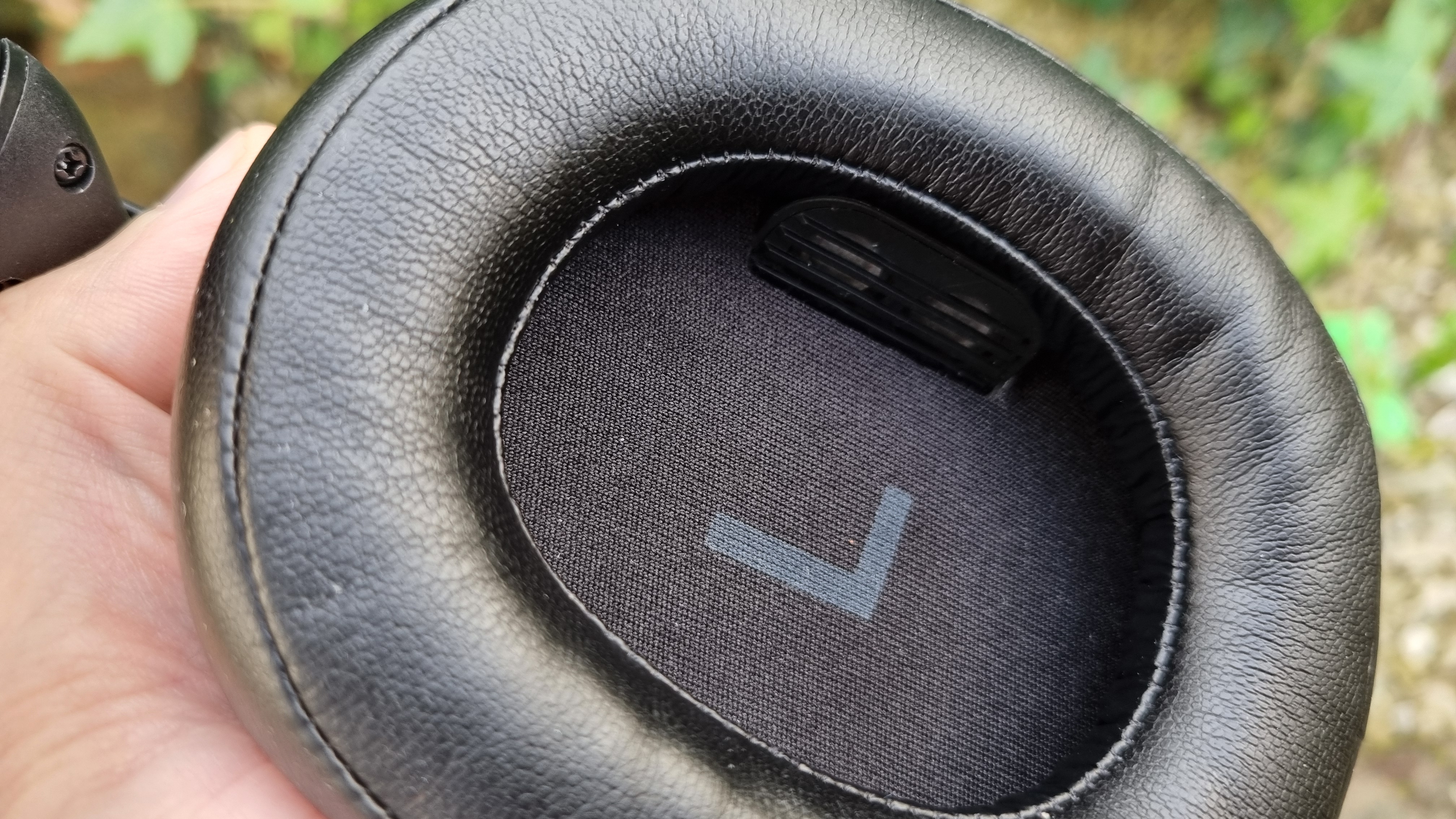 The internal left earcup of the Heavys H1H headphones, showing the exposed tweeter array inside.