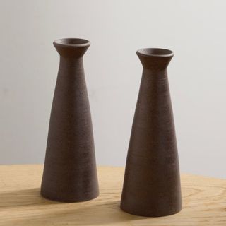 Two brown candle holders from Net-A-Porter