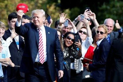 President Trump greets supporters.