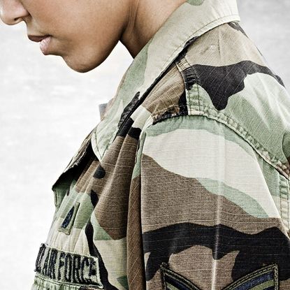 Clothing, Shoulder, Camouflage, Pattern, Military camouflage, Outerwear, Sleeve, Neck, Jacket, Arm, 