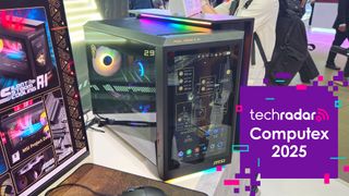 An MSI MEG Vision X AI gaming PC at Computex 2025 with a TechRadar @ Computex 2025 badge overlay
