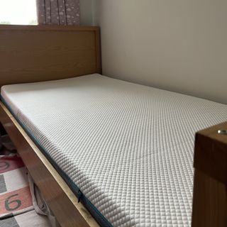 Simba Hybrid kids mattress on bed frame in writer's home