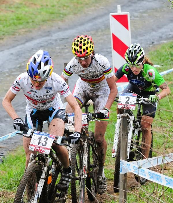 Elisabeth Osl (Central Pro) leads Marga Fullana (Massi) and Willow Koerber (Subaru / Gary Fisher) uphill