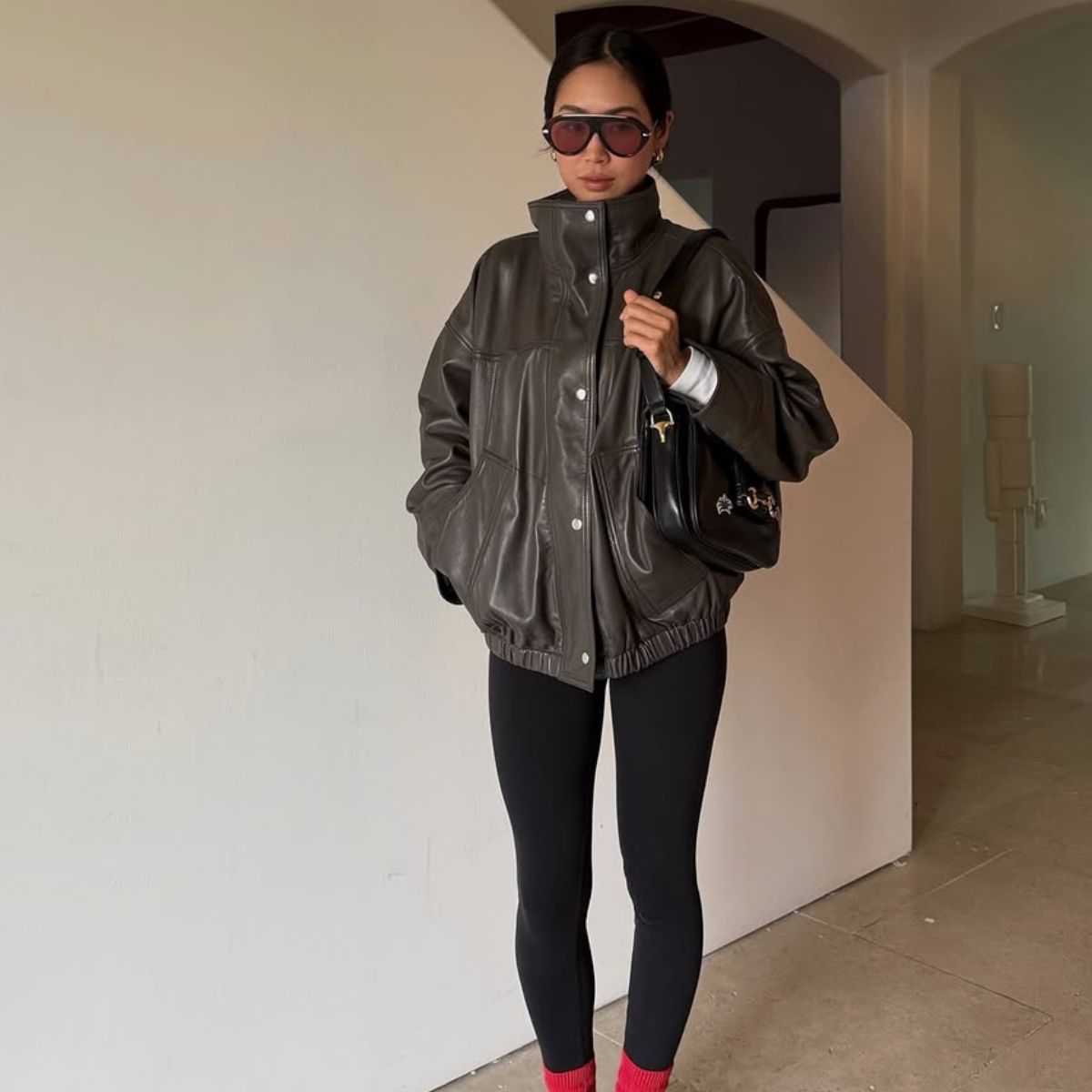 woman wearing sneaker outfit idea 2026