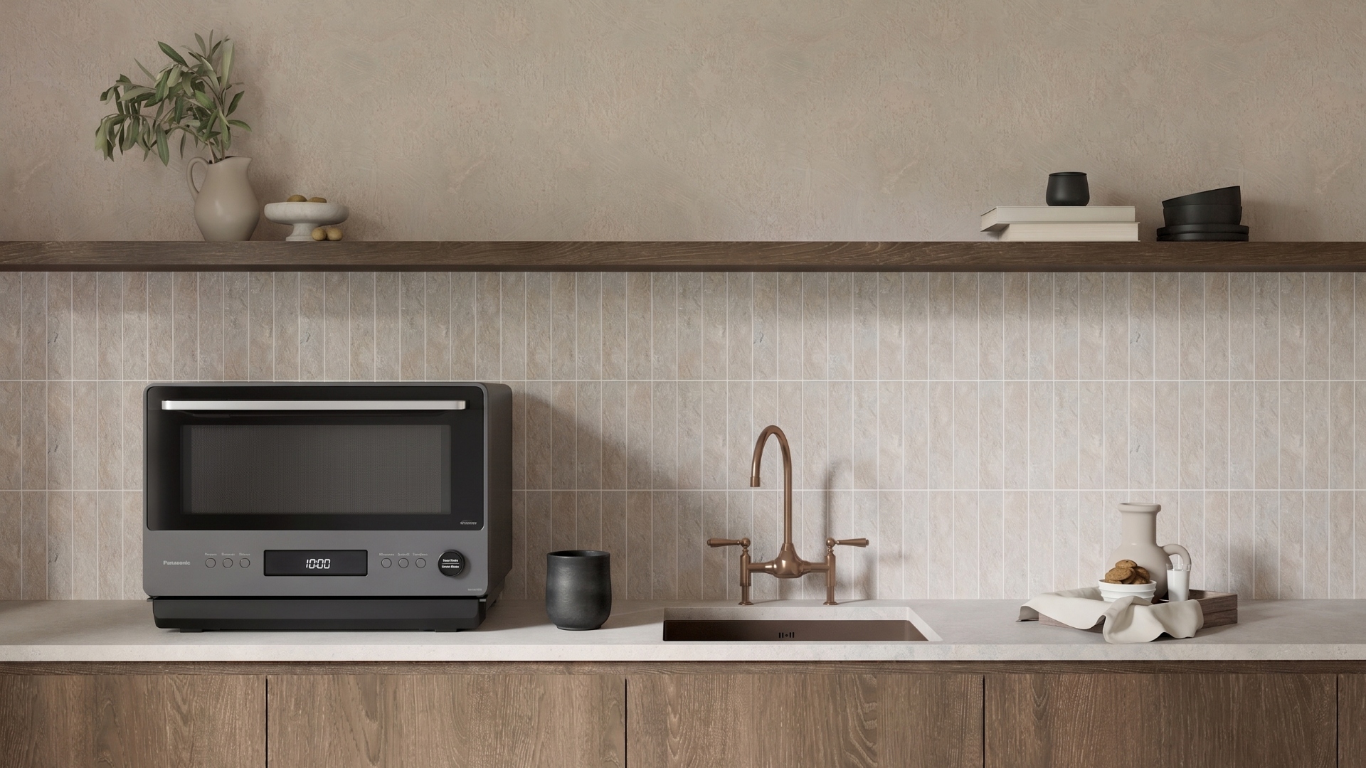 The Panasonic Japanese Microwave on a countertop next to a sink