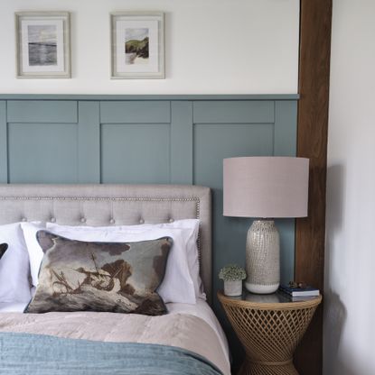 bedroom with blue wall panelling