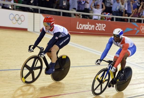 Britain's Jason Kenny (L) competes against France's Gregory Bauge to win the gold medal in the London 2012 Olympic Games men's sprint final