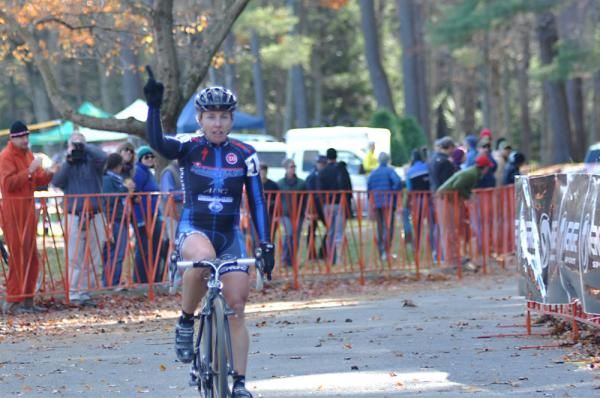 Laura Van Gilder (C3 - Athletes Serving Athletes) takes the top spot on the podium.