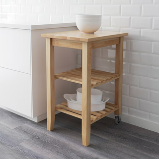 IKEA's wooden kitchen cart in a minimalist kitchen