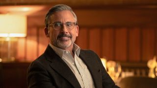 Steve Carell sitting in a restaurant in a scene from "Rooster" on HBO Max