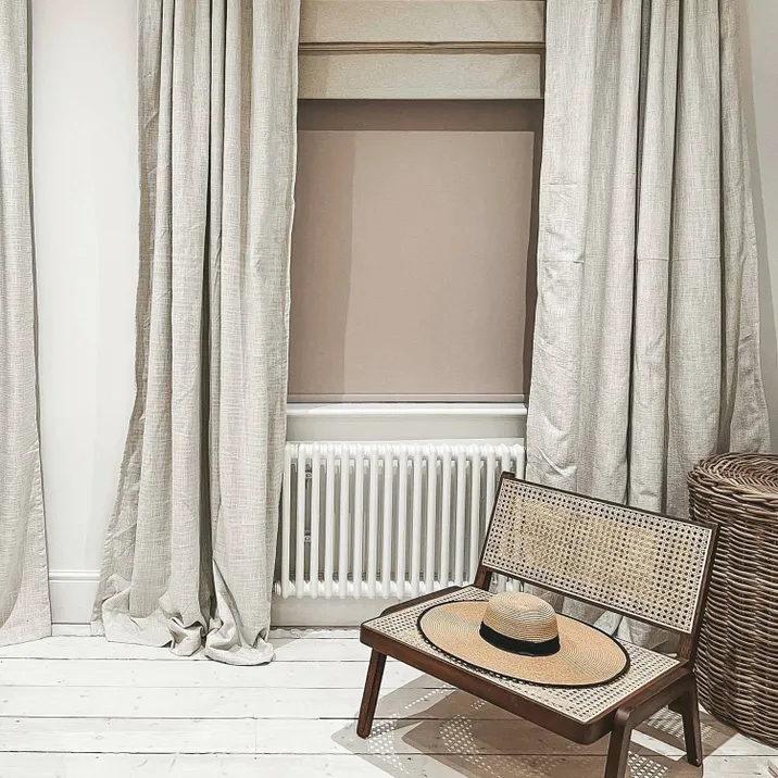 white column radiator below window