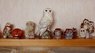 A row of ornamental owls