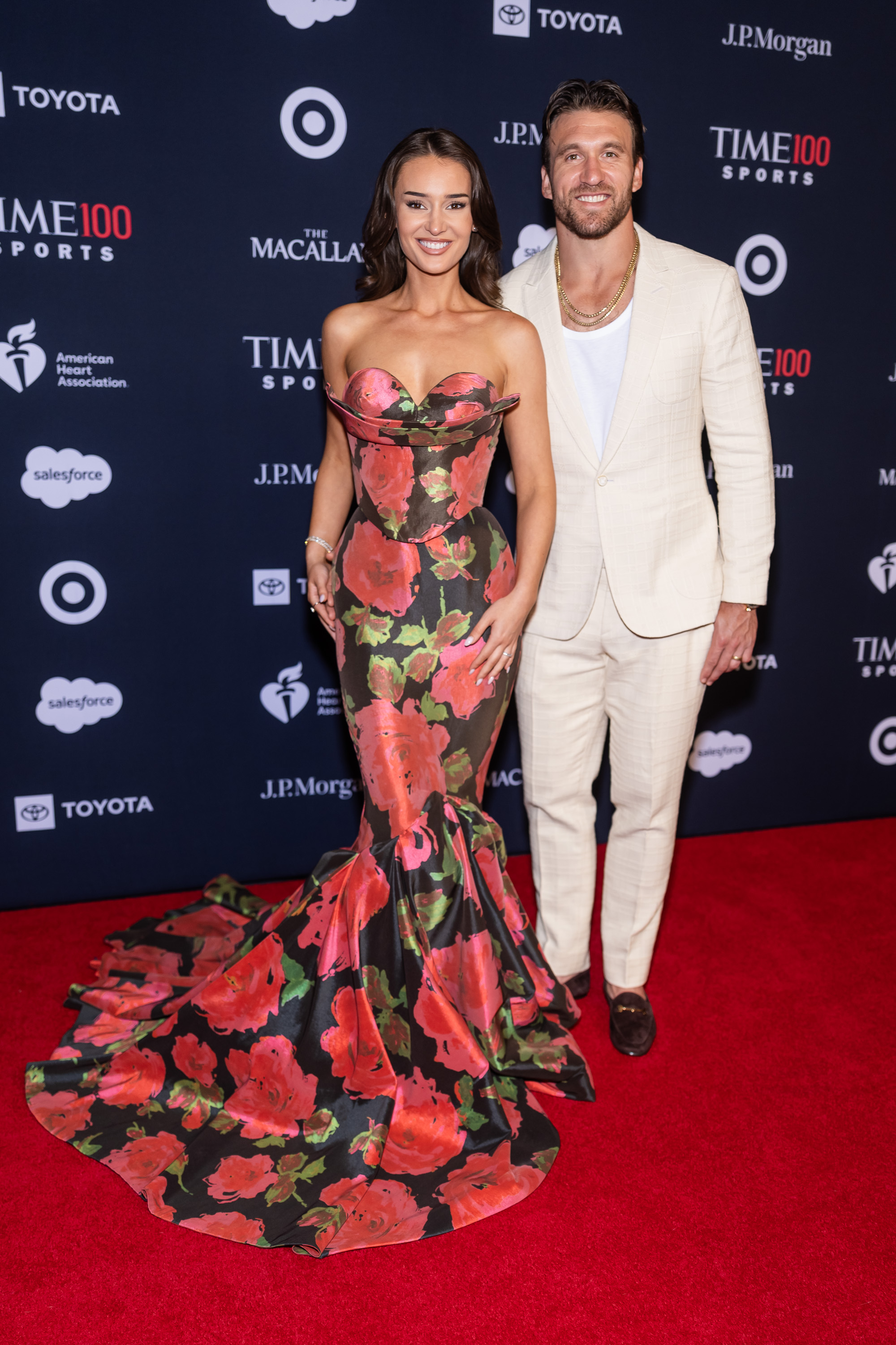 Kristin and Kyle Juszczyk posed in red carpet looks at the TIME100 Sports Gala 2026