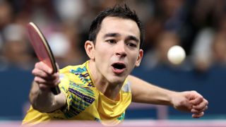 Hugo Calderano of Team Brazil competes in the
