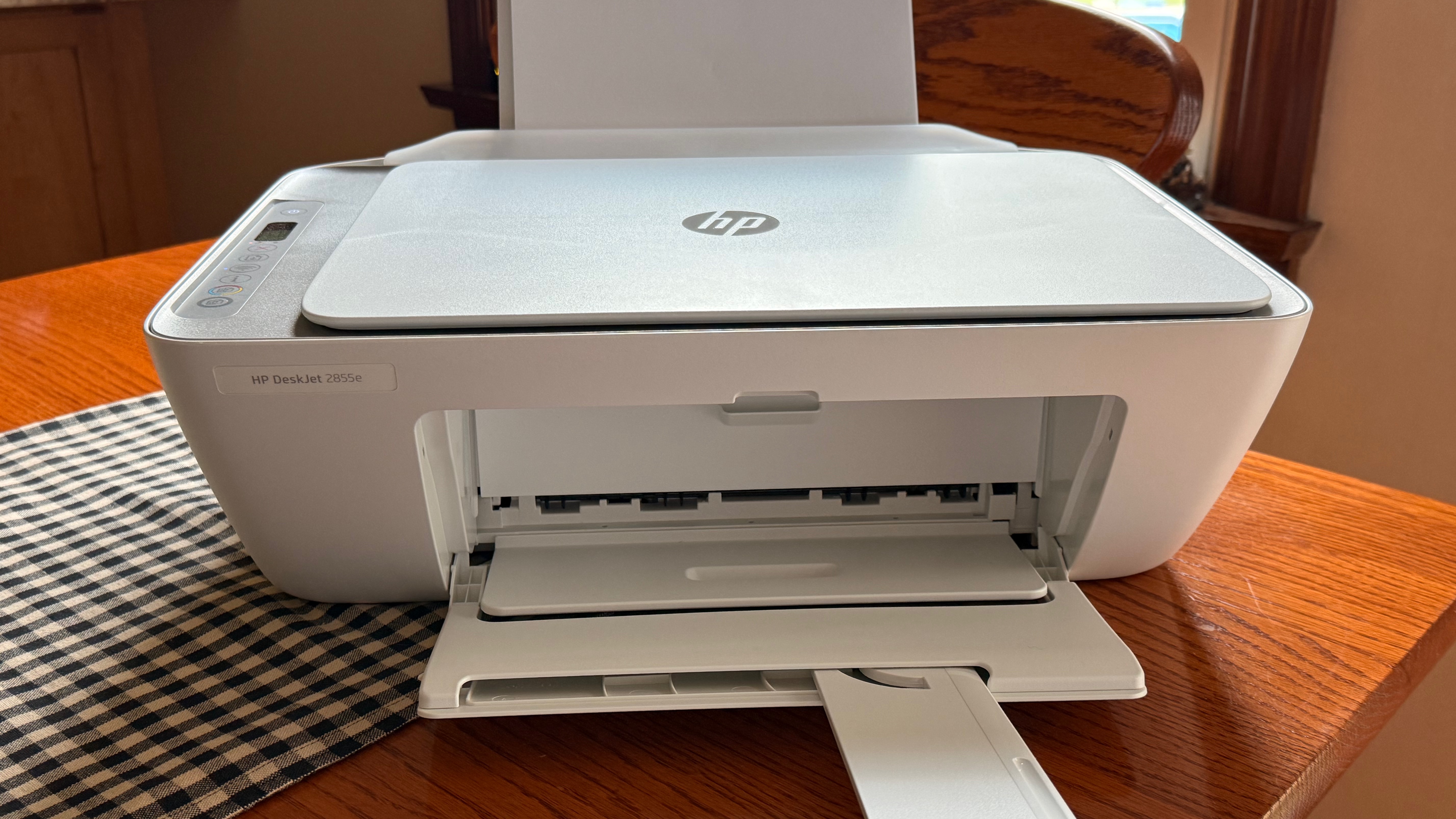 HP DeskJet 2855e from the front on a table