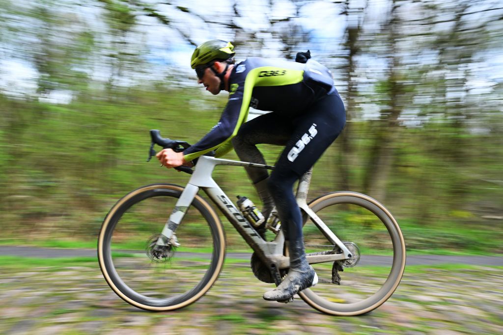 ROUBAIX FRANCE APRIL 05 Jannik Steimle of Germany and Team Q365 Pro Cycling Team trains at the Troue dArenberg cobblestones sector during the 121st ParisRoubaix 2024 Previews UCIWT on April 05 2024 in Roubaix France Photo by Luc ClaessenGetty Images