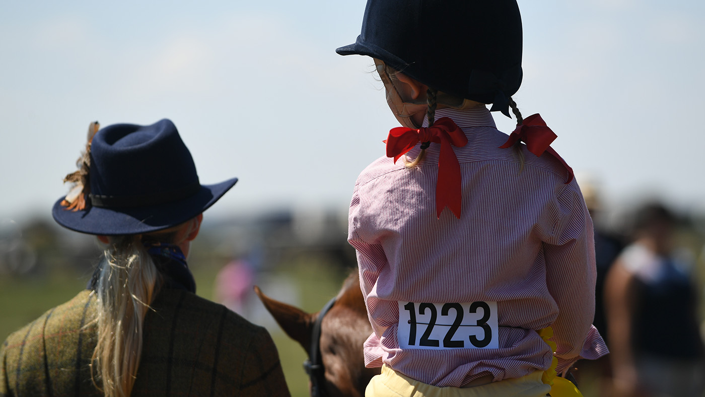 Behind shot of lead-rein trio
