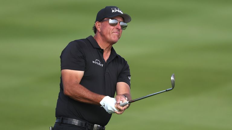 Phil Mickelson hits a shot