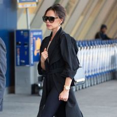 Victoria Beckham wears peep-toe shoes.