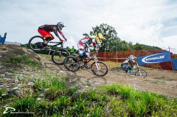 Four cross racers in action