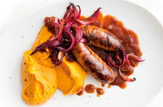 Sausages with sweet potato and squash mash