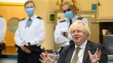 Boris Johnson during a visit to Uxbridge police station