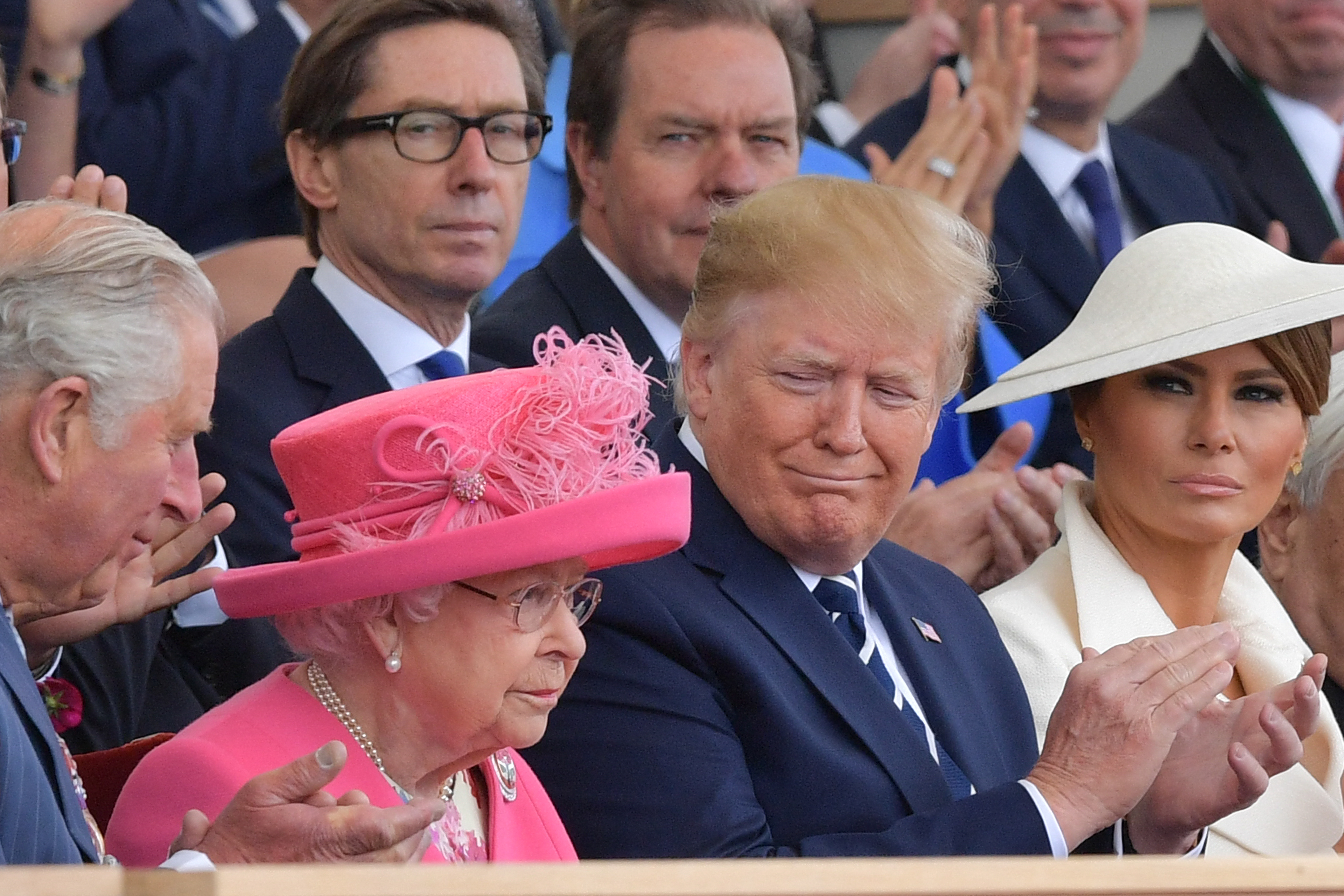 Donald Trump, Melania Trump, Queen Elizabeth and Prince Charles at a D-Day ceremony in 2019