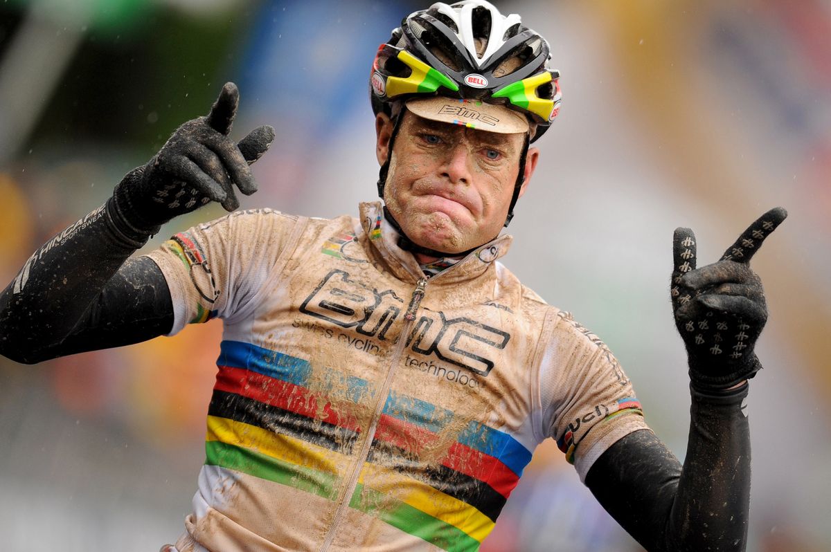 Cadel Evans wins a muddy stage 7 of the 2010 Giro d'Italia