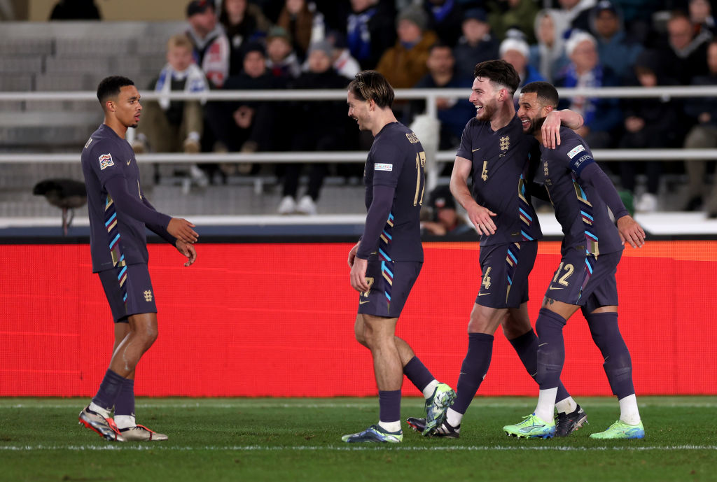 HELSINKI, FINLAND - OCTOBER 13: Declan Rice of England celebrates scoring his team's third goal with teammates during the UEFA Nations League 2024/25 League B Group B2 match between Finland and England at Helsinki Olympic Stadium on October 13, 2024 in Helsinki, Finland. (Photo by Eddie Keogh - The FA/The FA via Getty Images)